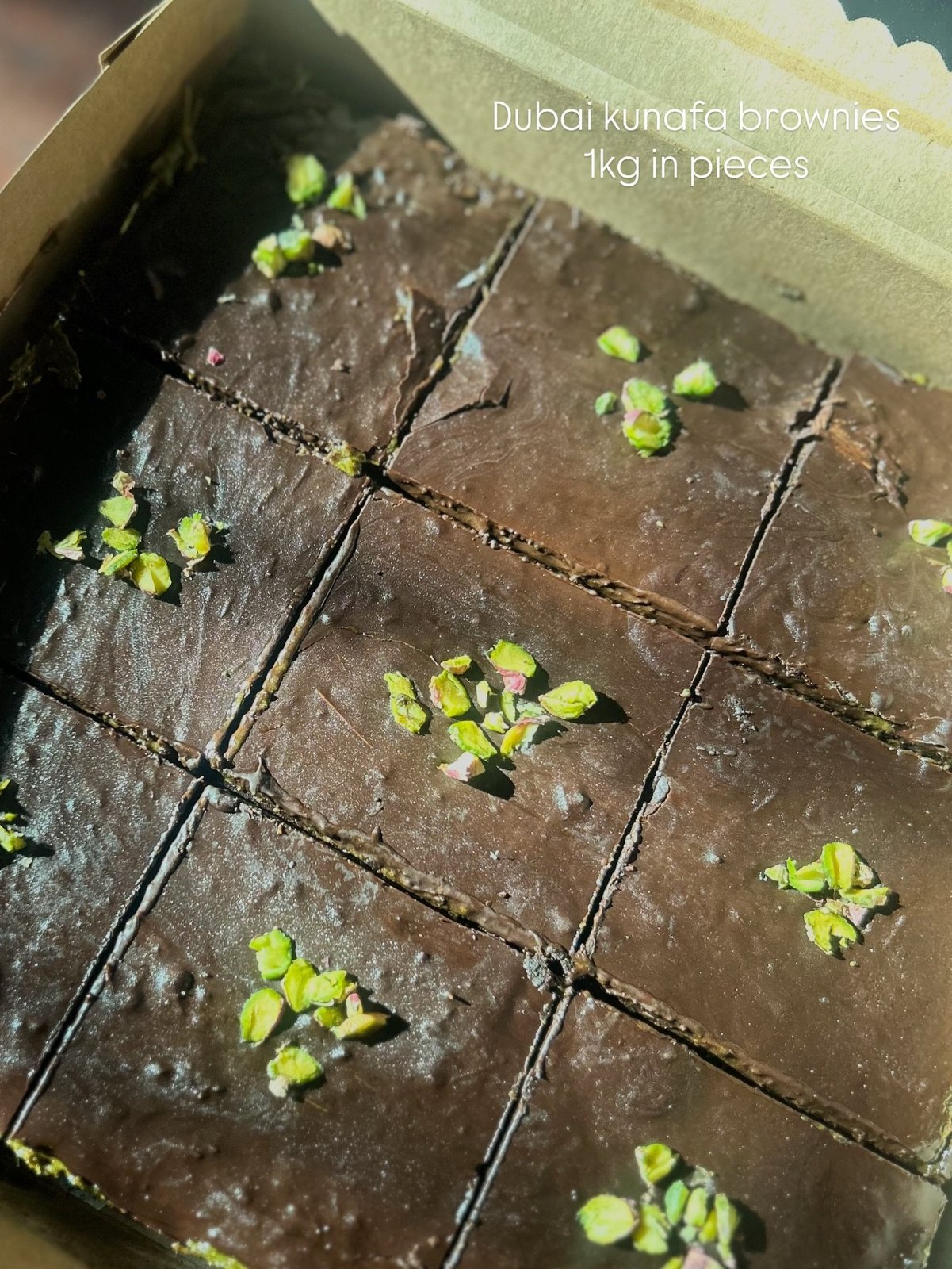 Dubai kunafa brownies topped with pistachio